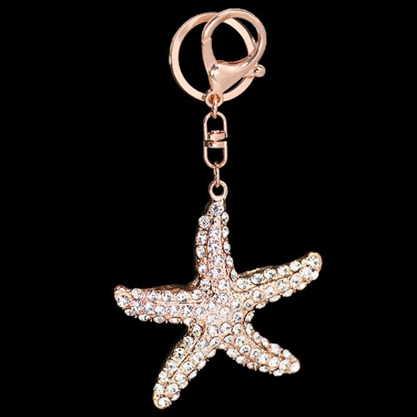 Rose gold starfish shaped keychain with silver crystal design