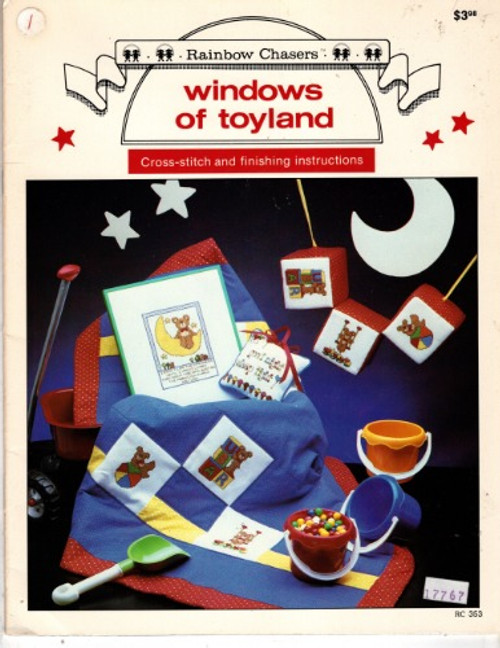 Rainbow Chasers Windows of Toyland Counted Cross Stitch Pattern booklet. Windy Skies, Just Pretend Lollipops, Best Friends, Naptime Comforter, Bedtime Blocks, Nursery Favorites, Afternoon Fun, Building Daydreams, Beach Party, Moon Ride, Nighttime Lullaby, Samll surprises, Alphabets and Borders, Rainy Day Thoughts, Pocket on a String, Peppermint Bear, Elizabeth Ann's Stocking, Everybody Loves a Parade