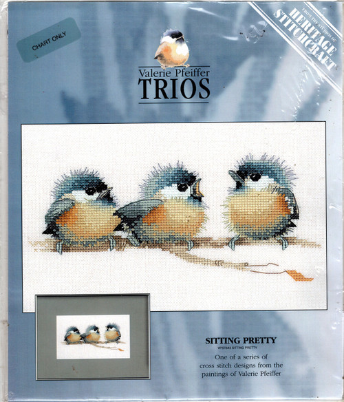 Heritage Crafts by Susan Ryder Trios Sitting Pretty counted cross stitch chartpack.  One of a series of designs from the paintings of Valerie Pfeiffer