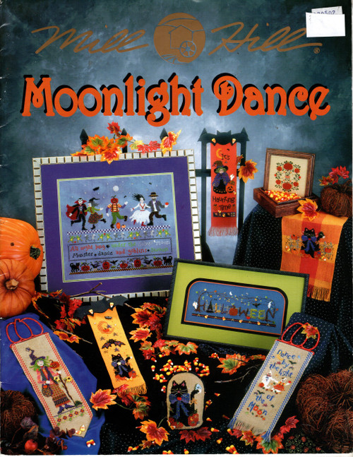 Mill Hill Moonlight Dance counted cross stitch booklet. Witch Banner, Pumpkins Pillow, Kitty Towel, Clandestine Claude, Pumpkin Box, Dance by the Light of the Moon, Harvest Leaves Towel, It's Haunting Time, Kitty Banner, Halloween Fence, Turkey Lurkey, Apple Vine Table Runner, Gather and Give Thanks Banner, Autumn Tree Banner, Apple Box, Autumn Banner, Welcome Pillow, Monsters Ball