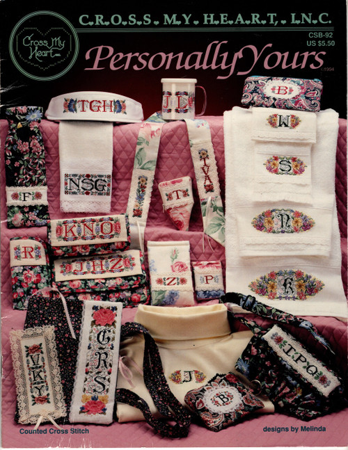 Cross My Heart Personally Yours counted cross stitch booklet. Melinda. Meadow Flower Triple Initial, Meadow Flower Oval, Rose Initial, Vertical Meadow Flower, Horizontal Meadow Flower, Rose Wreath, Vertical Rose Garden, Oval Filigree, Large and Small Alphabet, Arabesque Alphabet, Flower Garden Triple Initial, Vertical Flower Garden, Primrose Small Initial, Forget Me Nots, Primrose Triple Initial, Primrose Single Initial, Rose Bouquet, Aster Bouquet, Large Horizontal Rose Garden, Small Horizontal Rose Garden, Rose Garden Single Initial, Mini Rose Garden, English Garden I-IV