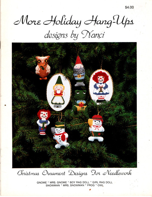 Designs by Nanci More Holiday Hang-Ups counted cross stitch booklet. Nancy Wisneskey. Gnome, Mrs Gnome, Boy Rag Doll, Girl Rag Doll, Snowman, Mrs Snowman, Frog, Owl