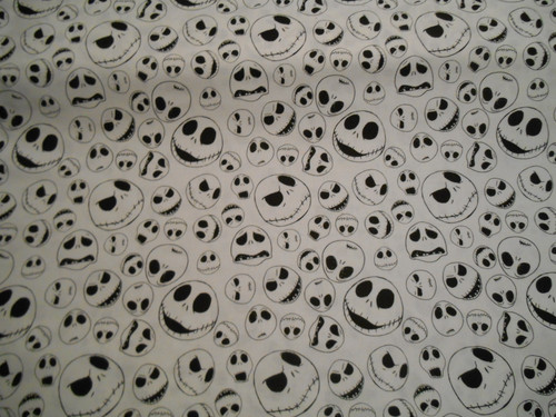 Camelot Nightmare Before Christmas Jack Faces White 100% cotton fabric. Jack Skellington.