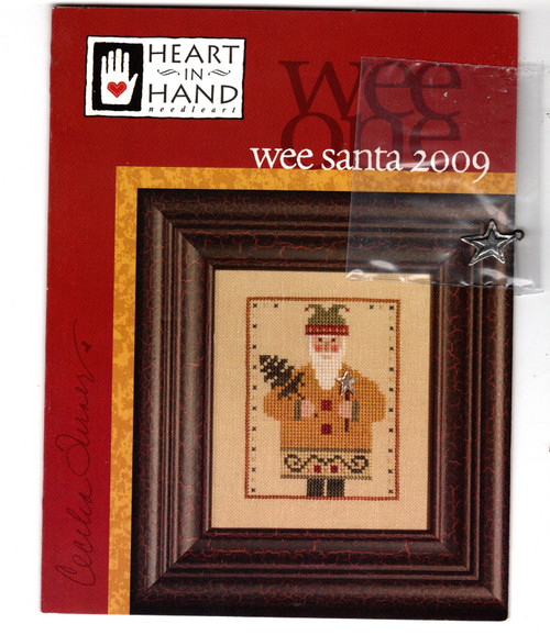 Heart in Hand Wee One Wee Santa 2009 counted cross stitch pattern leaflet with charm.  Cecilia Turner
