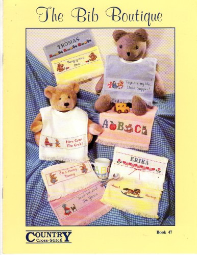 Country Cross Stitch The Bib Boutique Counted Cross Stitch Pattern booklet. Whoa Horsey, I'm a Funny Bunny, Hungry as a Bear, A is for Apple, Hearts and flowers, Name Train, Here Comes the Grub, Toys are my Life, Feed Me and I'm Yours. Alphabet for personalization