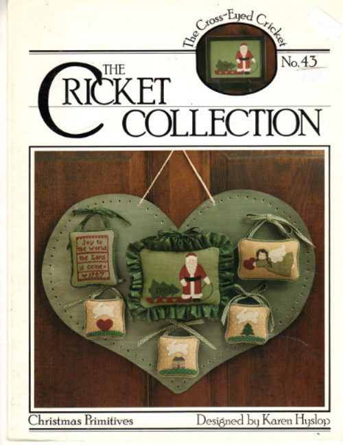 The Cross-Eyed Cricket Collection Christmas Primitives No. 43 counted cross stitch leaflet. Christmas Angel, Four Rabbit Ornaments, Joy to the World, Primitive Santa