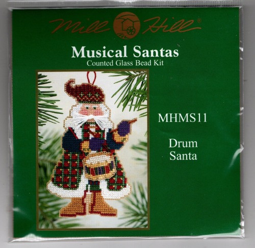 Mill Hill Drum Santa Musical Santas Kit. This kit is from the 2002 series. The kit contains Beads, perforated paper, floss, needles, chart and instructions