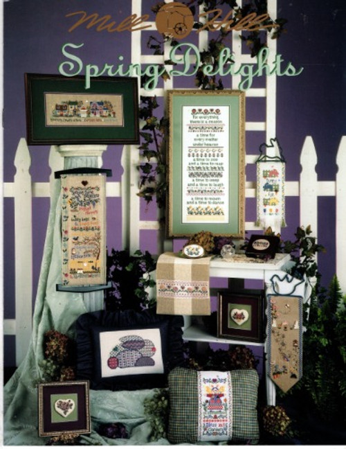 Mill Hill Spring Delights counted cross stitch booklet. Quilted Bunny, Every Season Sampler, Spring Primitive Banner, Bunny Fun Banner, Spring Village, Floral Hinged Box, Spring Flower Oval Box, Rose Charm, Floral Heart Crystal Box, Flower Basket Charm, Bless My Garden Pillow, Springtime Delights Banner, Pansy Towel