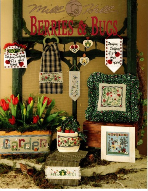 Mill Hill Berries and Bugs counted cross stitch booklet. Potting bench, Bee Skep Charm, Lady Bug Bag, Lady Bug Banner, Lady Bug Charm, Garden Basket Band, Frog Pond Charm, Berry Patch Pillow, Berry Towel, Berry Tote, Bug Banner, Frog Towel.