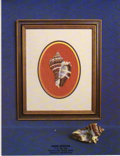 Annie Design This is the Magic of the Sea counted cross stitch pattern booklet. Bubble Shell, Border for Bubble Shell, Scallop Shell, Sundial, Scotch Bonnet, Strawberry Shell, King Crown Conch, Nautilus with Sand Dollar, Cone Shell, Tibia, Poached Egg Cowry, Frog Shell, Babylon Shell