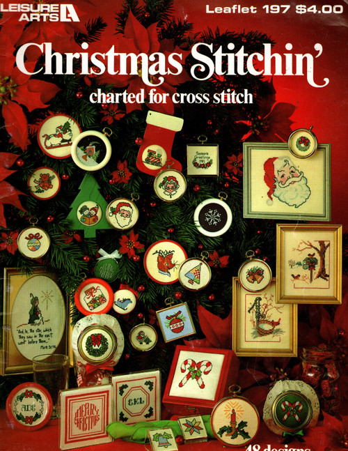 Leisure Arts Christmas Stitchin' Counted Cross Stitch Pattern booklet. Anne Van Wagner Young. 48 designs. Angel, Shepherd, Madonna and Child, Candy Cane, Teddy Bear, Holly Wreath, Candy Jar, Santa, Reindeer, Sleigh, Stocking, Large Blue Bells, Train, Pump, Mailbox, Santa Trimming Tree, Large Candle with HOlly, Snowmen Carollers, Old Fashioned Ornaments, Children Skating, Waiting for Santa, God Bless Santa Claus, Mr Snowman, Candy Wreath, Children Trimming Tree, Sleighing Santa, Cottage, Season Greetings, Holiday Greetings, Merry Christmas, Initial Round Design, Initial Square Design, Snowflakes, Small Gold Bells, Christmas Tree, Patchwork Candle, Patchwork Bell, Patchwork Tree, Patchwork Star, Small Candle