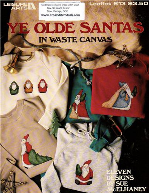 Leisure Arts Ye Olde Santas in Waste Canvas cross stitch Pattern booklet. Sue McElhaney. Red Santa with Tree, Blue Santa with Cane, Blue Santa with Tree, Sitting Santa, Red Santa with Bag and tree, Red Santa with Star, Green Santa with Basket, Santa Trio, Half Moon Santa, Gold Santa with Tree, Green Santa with Bag