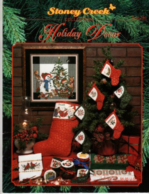 Stoney Creek Holiday Decor Counted cross stitch pattern booklet. Kitty with Ornament, Christmas Floral, Christmas Cardinals, Christmas Rose, Joy to the World, Ho Ho Ho, Drum and Horn, Holiday Motif, Christmas Bells, Crhsitas Crown, Teddy and Snowfriend, Woodland Christmas, Reindeer, Gingerbread Pair, Jolly Santa, Santa's Elf, Santa's Bear, Santa Z's, Christmas Ornament, Santa's Star, Christmas Candle, Christmas Star Motif