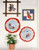 Country Cross Stitch The Berenstain Bears Cross Stitch Pattern booklet. Adapted for Paragon Needlecraft. Summer Skies, Sister Bear and Rainbow, Pape Bear, Home Sweet Tree, March Winds, Berenstain Picnic, Mamma's Lap, Summer Friends, Jogger, Slugger