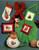 Millcraft Inc. Garfield A Very Merry Christmas counted cross stitch booklet. Simone Miller. Wreath, Stocking Stuffer, Little Helper, Christmas Tree, Feed Me, Drummer Cat, Here's Santa, Santa Circle, Ornaments Star, Santa, Angel, Moon, Skating, Ride Em Reindeer