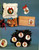 Millcraft Inc. Garfield A Very Merry Christmas counted cross stitch booklet. Simone Miller. Wreath, Stocking Stuffer, Little Helper, Christmas Tree, Feed Me, Drummer Cat, Here's Santa, Santa Circle, Ornaments Star, Santa, Angel, Moon, Skating, Ride Em Reindeer
