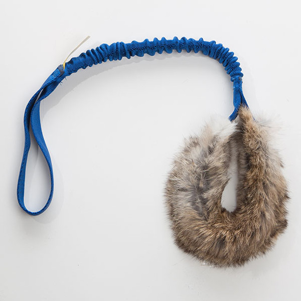 Real rabbit fur dog tug toy for agility or flyball. 