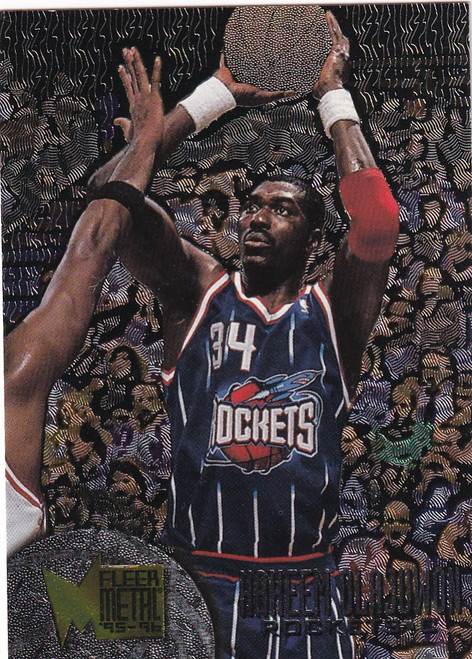 1996 FLEER #154 DIKEMBE MUTOMBO METAL- HOUSTON ROCKETS