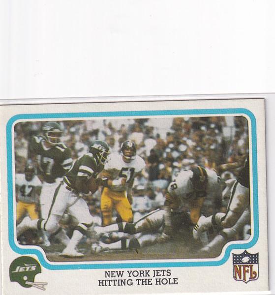 1979 FLEER #37 NEW YORK JETS HITTING THE HOLE- NEW YORK JETS