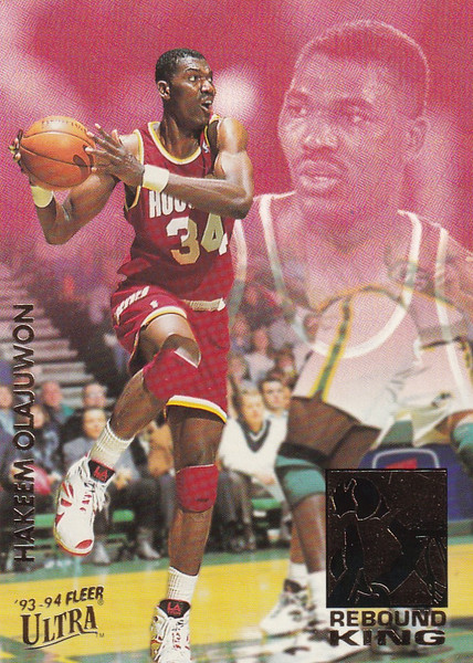 1994 FLEER #8 HAKEEM OLAJUWON REBOUND KING- HOUSTON ROCKETS