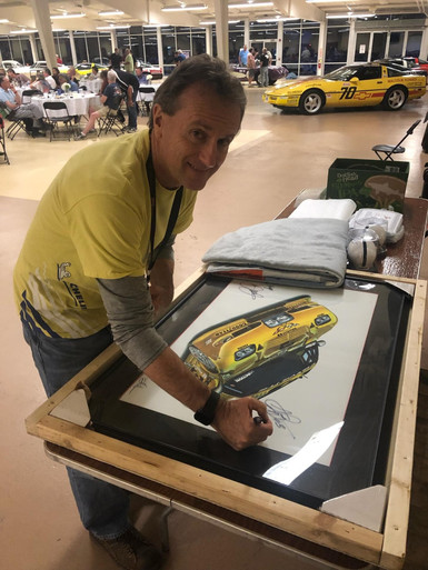ANDY PILGRIM SIGNING "THE LAST CORVETTE DALE RACED" GICLEE PRINT PREVIOUSLY SIGNED BY DALE EARNHARDT JR. OWNED BY LANCE MILLER OF CARLISLEEVENTS.COM