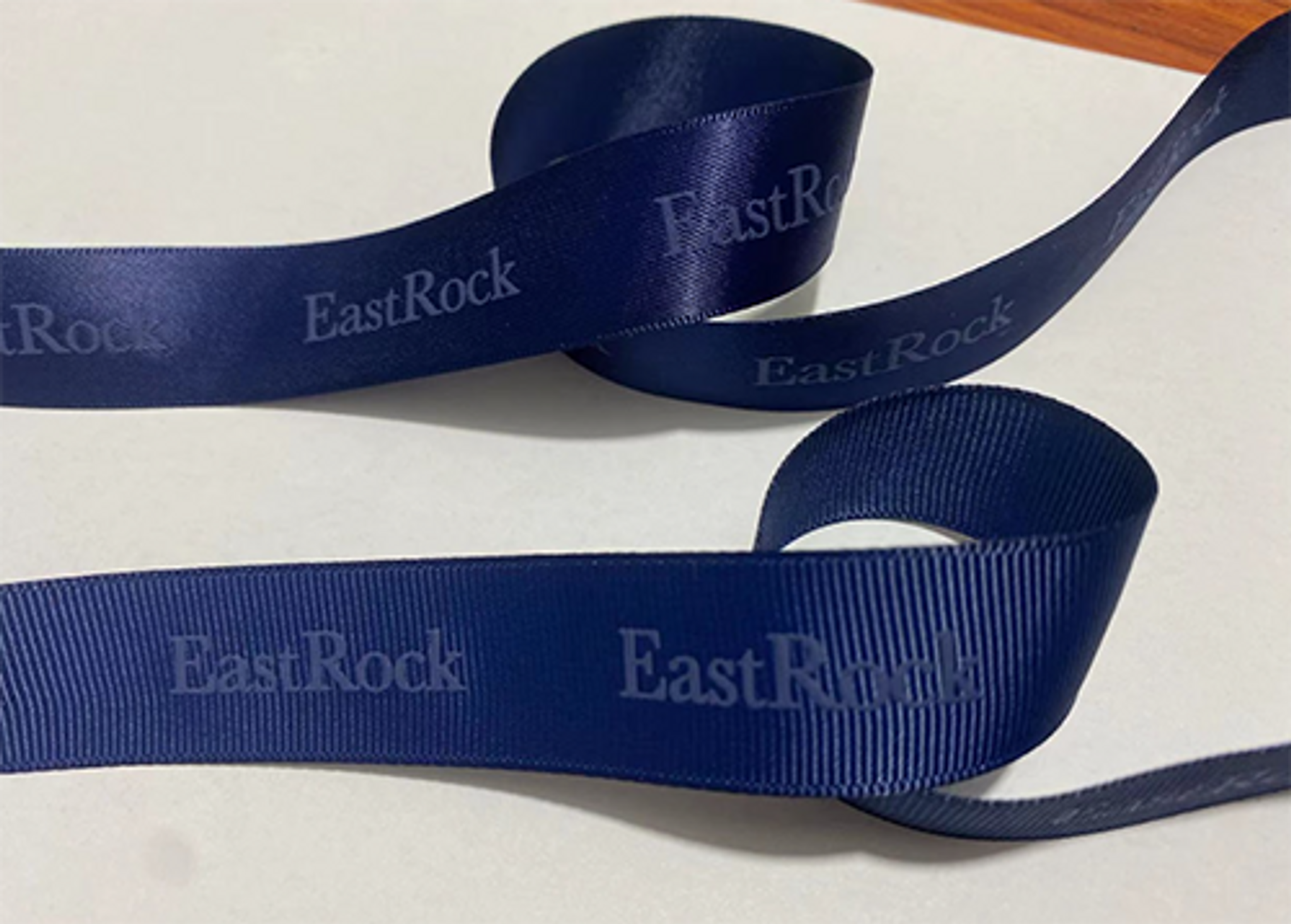 The Charm of Tone on Tone Custom Logo Ribbons