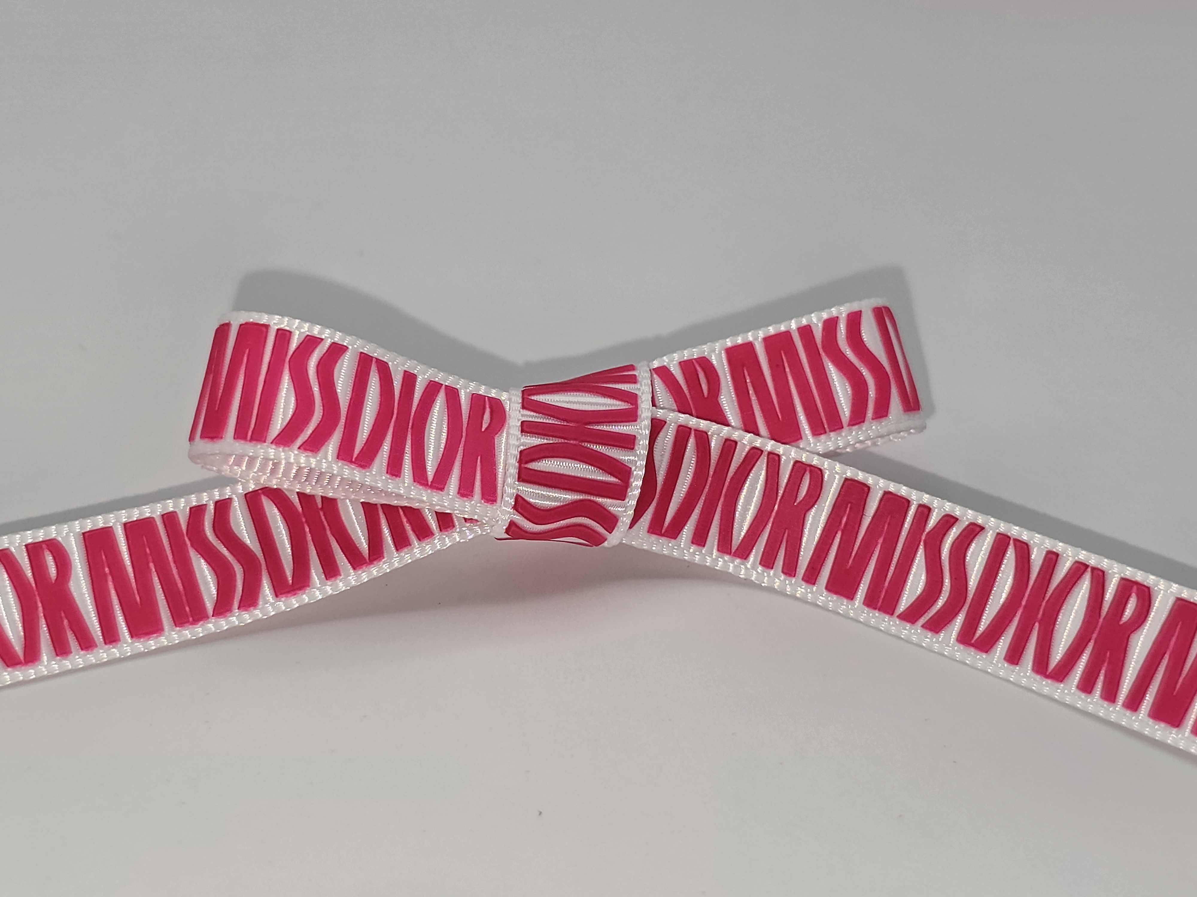 custom logo grosgrain ribbon, custom logo ribbon, custom pantone matching ribbon, raised print on grosgrain ribbon, pantone matching branding ribbon