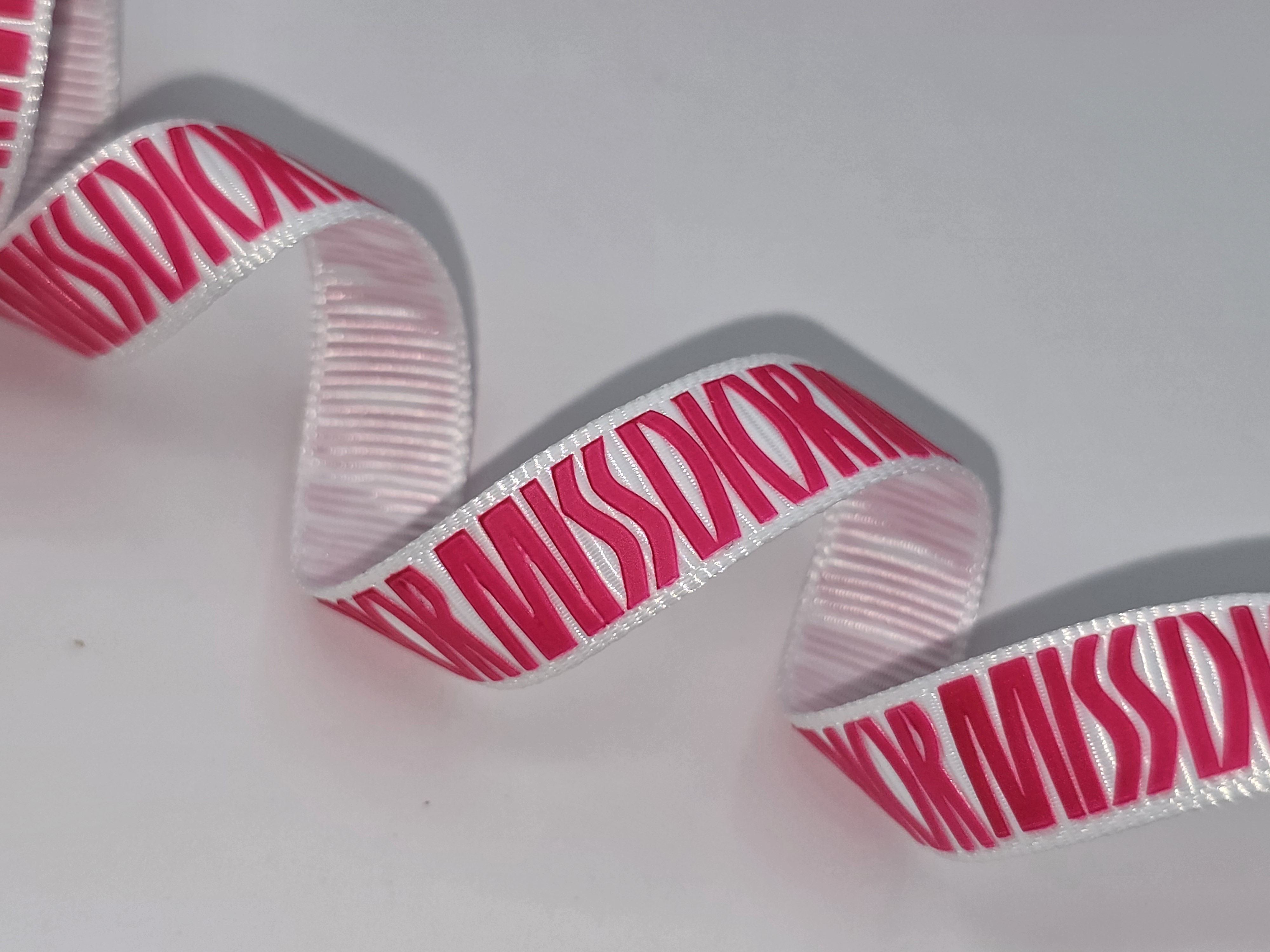 custom logo ribbon, raised print on grosgrain ribbon, Pantone matching print, custom logo grosgrain ribbon, custom branding ribbon, raised print on ribbon