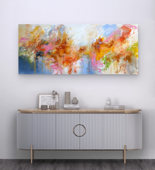 Vibrant abstract painting in golden yellow, warm orange, soft pink and sky blue with lime green accents and energetic gestural brushstrokes.
