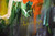 The Essence of Movement triptych detail - dark blue turquoise sap green with Indian yellow ochre orange gestural brushwork