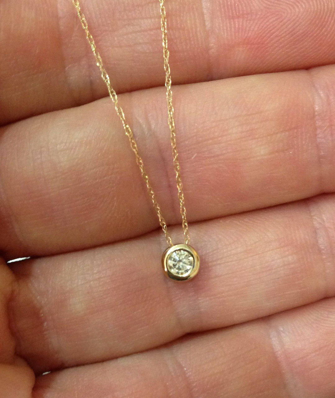 The Double Star Diamond Pendant (1/4 ct tw.)