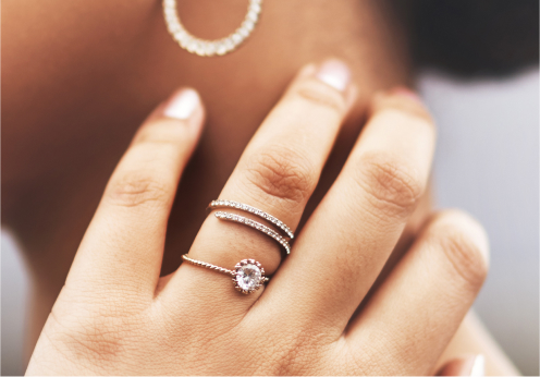 stack of rings on a woman’s ringer
