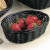 Tablecraft 2474 Black Oval Rattan Basket 9" x 6" x 2 1/4" - BREAD2474B
