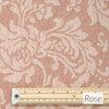 Catalonia Damask Acrylic Coated Fabric. Colour: Rose - pictured with a wooden rule.