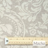 Catalonia Damask Acrylic Coated Fabric. Colour: Mocha - pictured with a wooden rule.