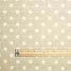 Wipe Clean Acrylic Coated Fabric - Mirha Polka Beige. Pictured with a ruler to show scale.