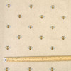 Valencia: Bees wipe clean acrylic coated tablecloth - shown  with  a rule