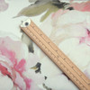 Wipe Clean Fabric - Digital Peony. Pictured with a wooden ruler to show scale