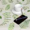 Wipe Clean Tablecloth - Digital Freya. Pictured with a cup and saucer, 'phone and  pen.