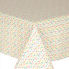 Navarra: Lina.  Wipe Clean Tablecloth, pictured on the corner of a table.