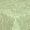 Wipe-clean Fabric: Navarra: Ceres Verde. Pictured draped on the corner of a dining table.