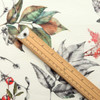 Wipe Clean Acrylic Coated Fabric - Navarra: Jingle.  Pictured with a wooden ruler to show scale.