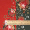 Navarra Festive wipe clean acrylic oilcloth fabric pictured with a ruler to show scale.