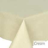 Living Weave Acrylic Coated Tablecloth - Cream. Shown on a table