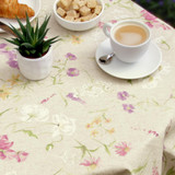 Wipe Clean Tablecloth - Mirha Spring - pictured with a table setting