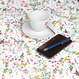Digital Amelie: Wipe Clean Tablecloth - pictured with a cup and saucer, 'phone and pen.
