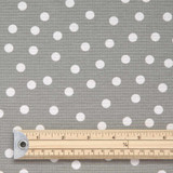 Loneta Fantasy Dots (Grey) - Extra Wide Acrylic Coated Tablecloth - pictured with a wooden ruler.