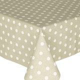 Loneta Polka - Cream. Wipe Clean Fabric pictured on a table.