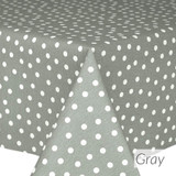 Loneta Fantasy Dots - Grey. Wipe Clean Fabric pictured on a table.