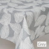 Acrylic Coated Tablecloth - Living: Feathers - Grey. Shown on a table